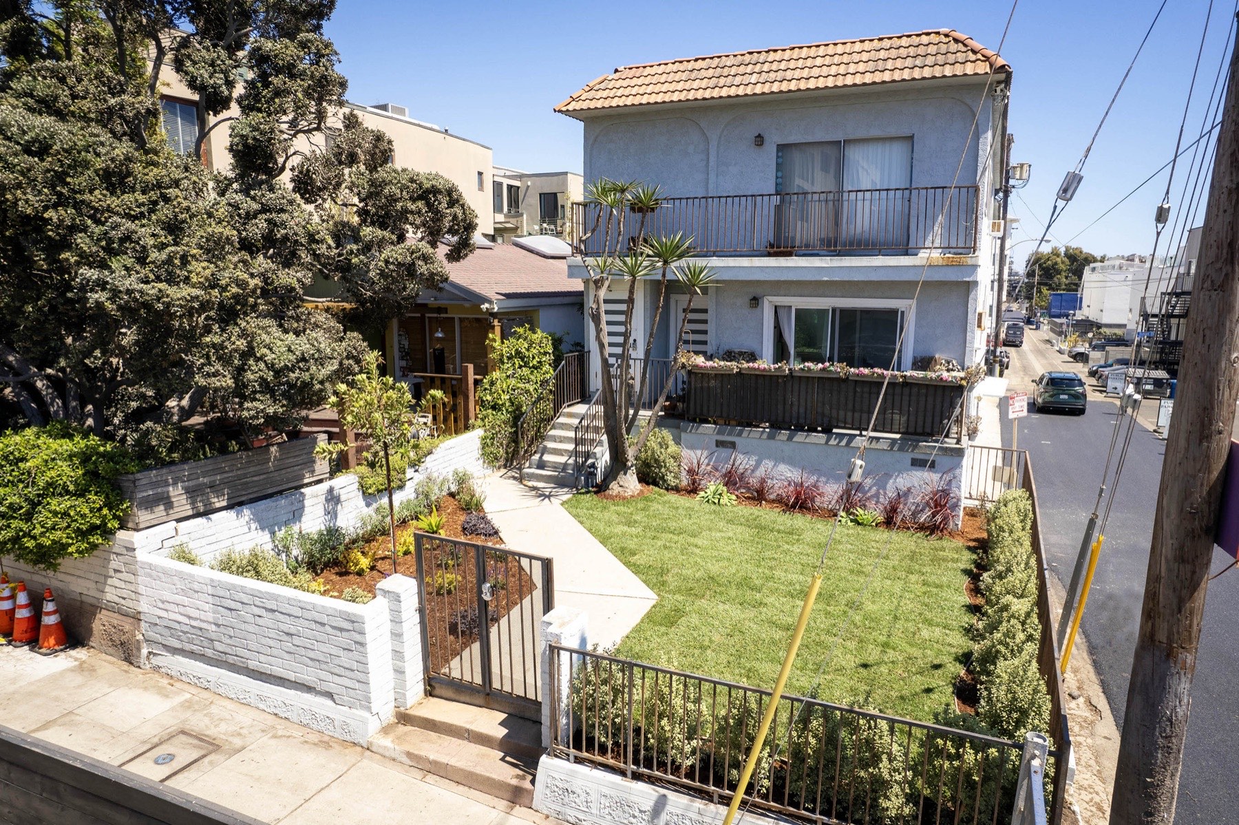 Front exterior of 18 Sunset Ave with landscaped garden and tiled roofline